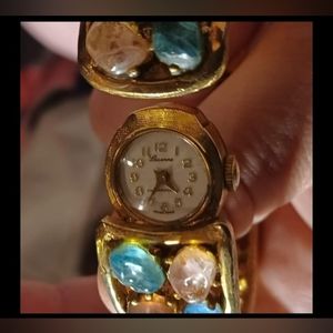 Antique Bangle watch with glass stones.